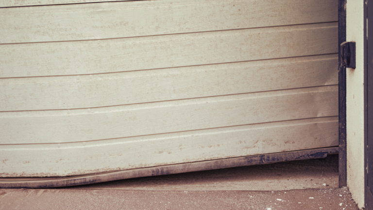 How do I know if my garage door is misaligned