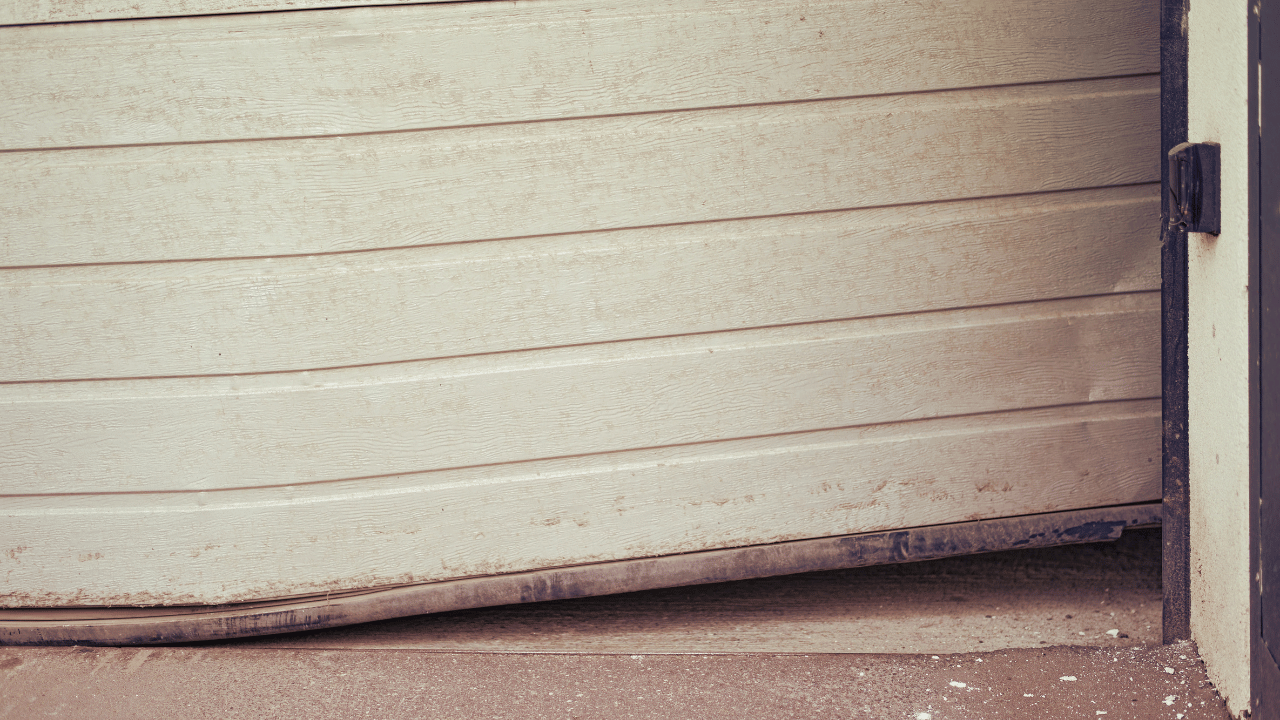 How do I know if my garage door is misaligned?